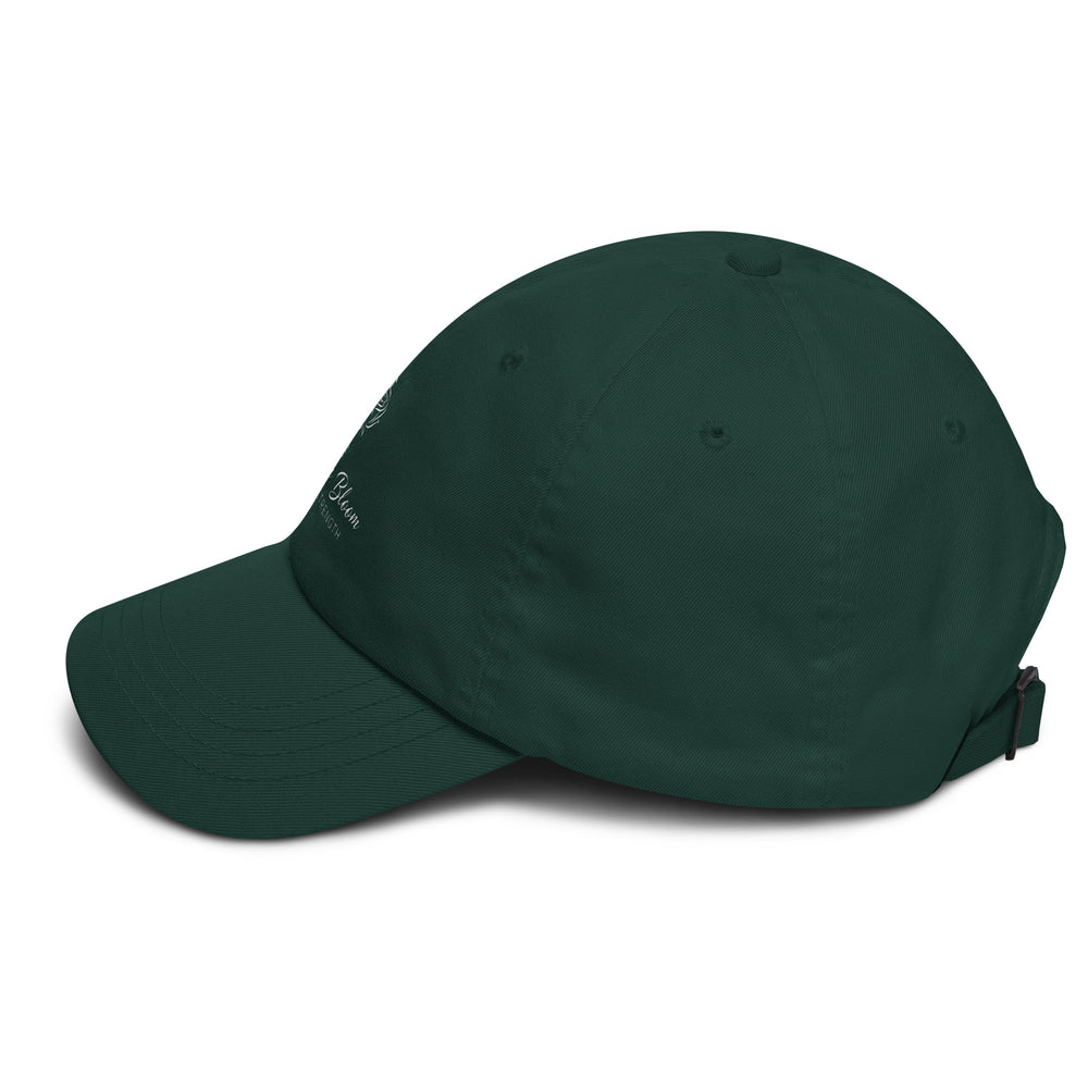 Unisex hat Empower Bloom Hat | Rose and Arrow Logo - Grace & Strength | Classic Statement Cap in dark green color.
